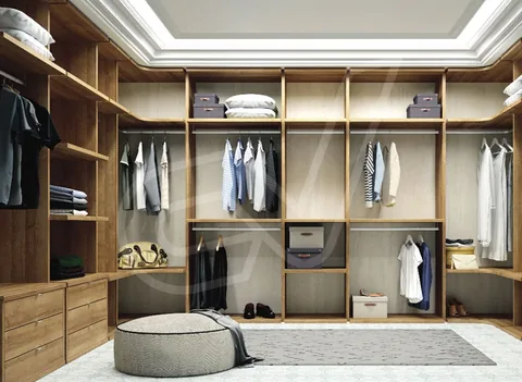 Vestidor de madera con módulos abiertos y suelo de tarima