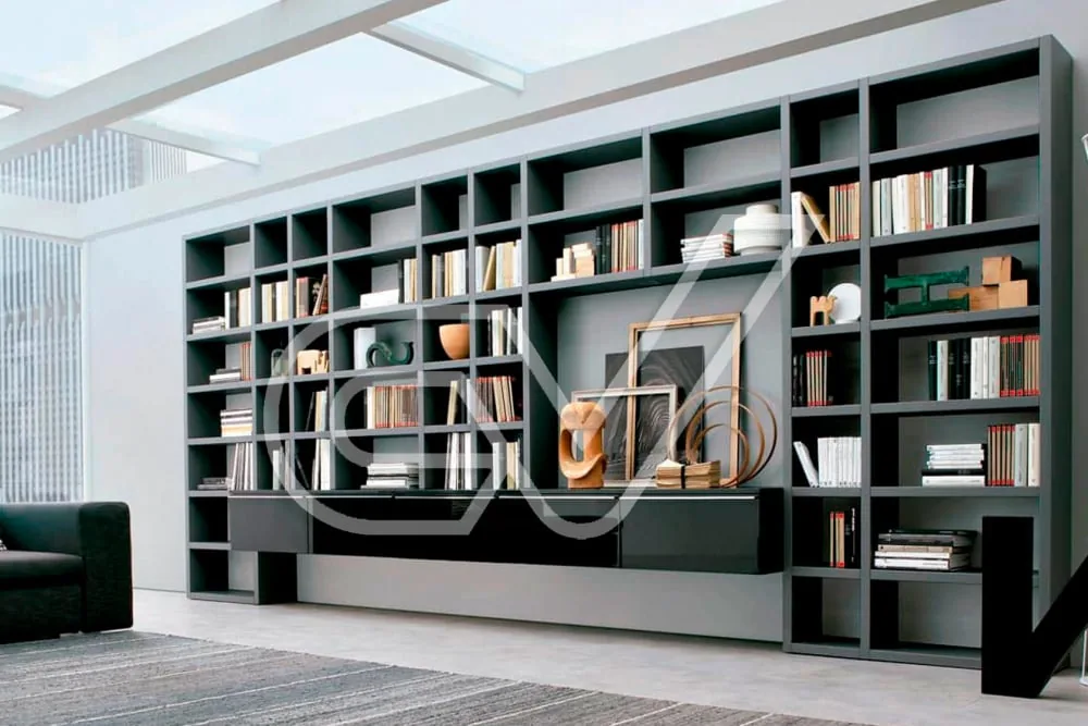 Librería a medida de suelo a techo en un salón